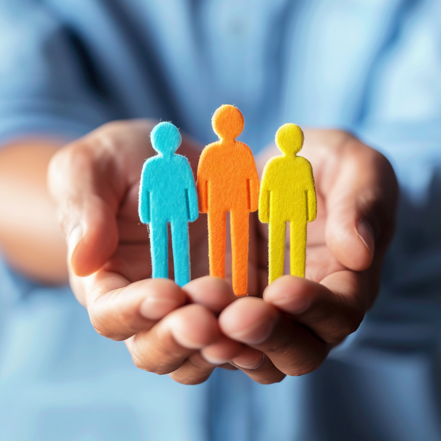 Open hands holding people indicating services provided